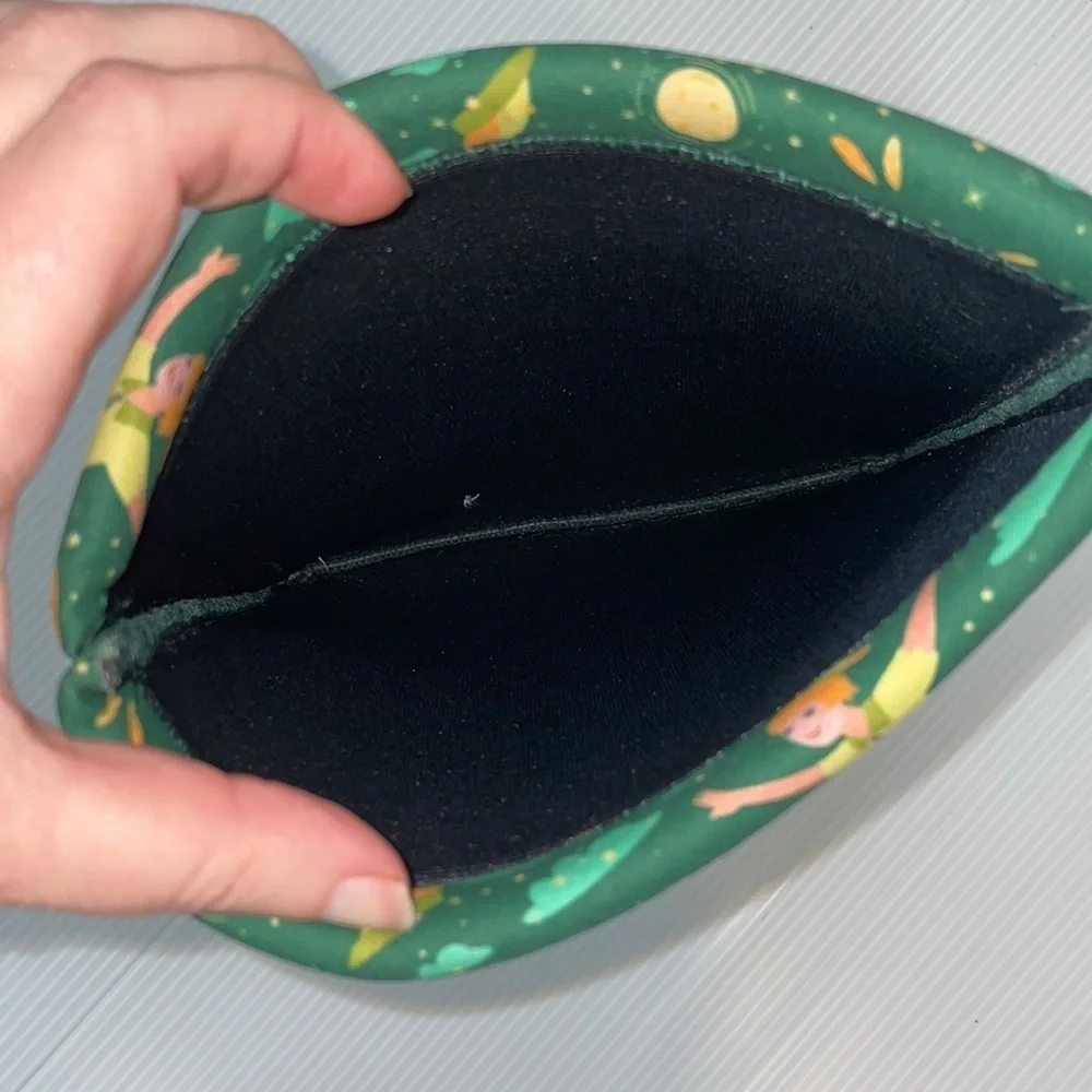 Padded tablet cover or book reader cover with Peter Pan print design